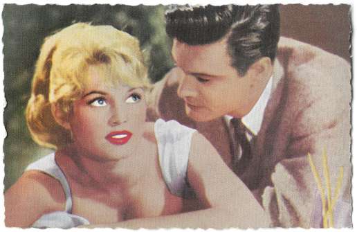 Brigitte Bardot and Louis Jourdan in La mariée est trop belle (1956)